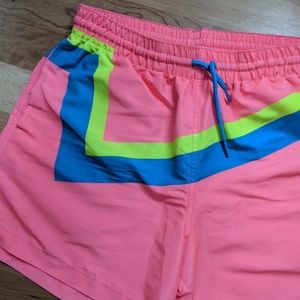 neon pink swim trunks